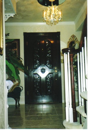 Solid mahogany door, ornate railing, Italian marble floor