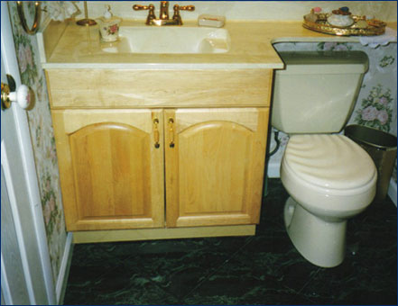 cultured marble sinktop and maple vanity